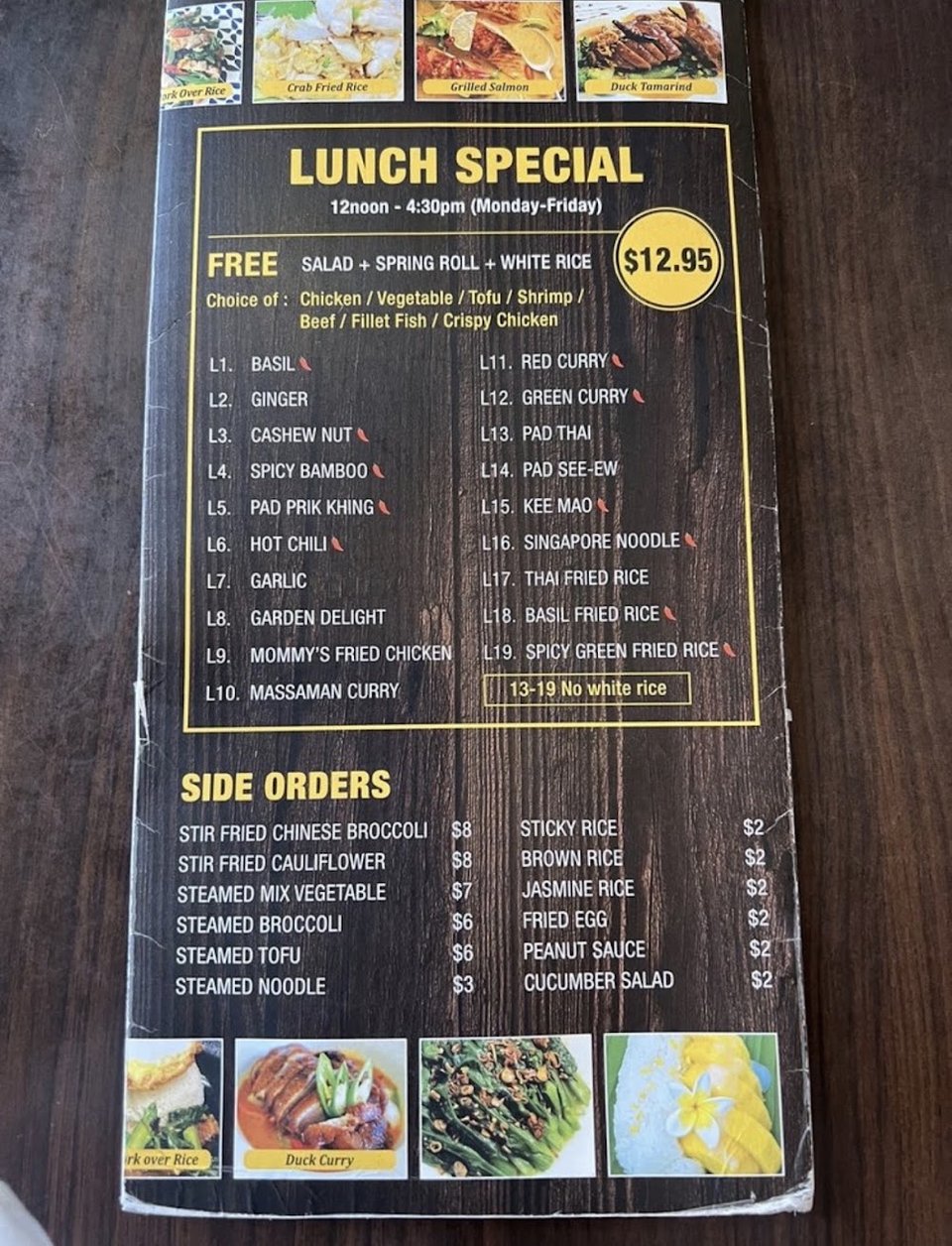 Printed Thai menu with curry options.